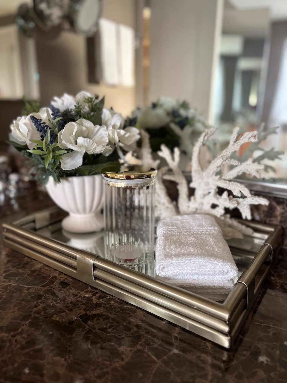 Luxury bathroom vanity tray with styled accessories